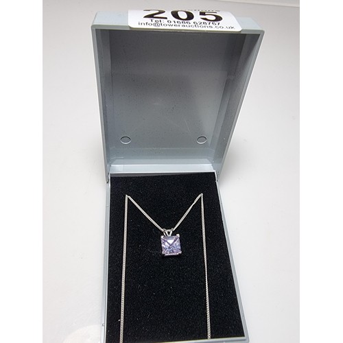 205 - A pretty 925 silver pendant with a faceted light purple coloured CZ crystal stone on an 18