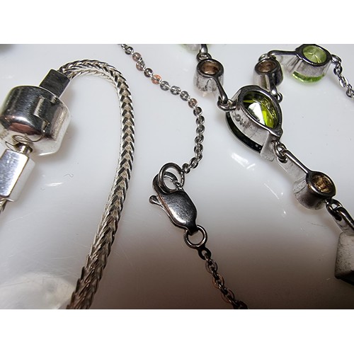 214 - A collection of various 925 silver jewellery to include an ornate long drop necklace inset with vari... 