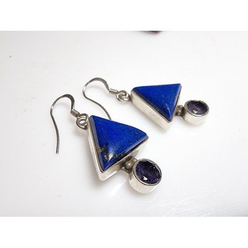 217 - A pair of ornate 925 silver drop earrings inset with triangular formed lapis lazuli stones and ameth... 