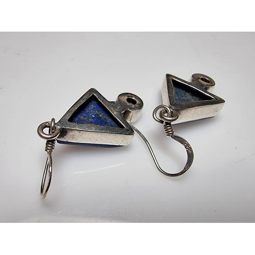 217 - A pair of ornate 925 silver drop earrings inset with triangular formed lapis lazuli stones and ameth... 