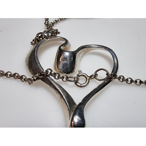 222 - A 925 silver large heart pendant set on a good belcher link 18