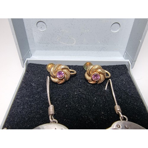 225 - A pair of large 925 silver dolphin drop earrings along with a pair of pretty 14k rolled gold screw b... 