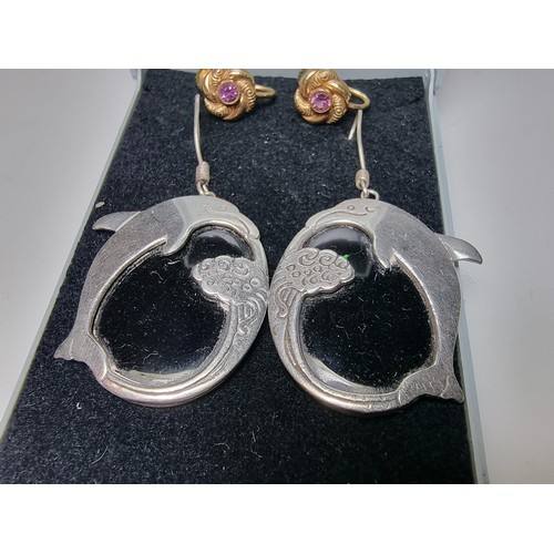 225 - A pair of large 925 silver dolphin drop earrings along with a pair of pretty 14k rolled gold screw b... 