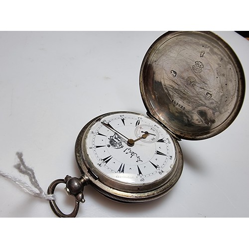 233 - A hallmarked silver foreign full hunter pocket watch featuring an enamel dial with an Arabic script ... 