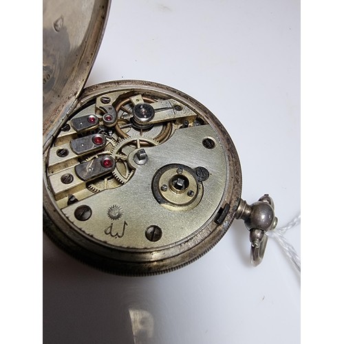 233 - A hallmarked silver foreign full hunter pocket watch featuring an enamel dial with an Arabic script ... 