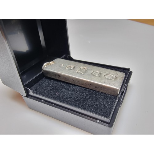 235 - A good quality hallmarked silver heavy thick gauge ingot with large clear hallmarks to the front. Th... 