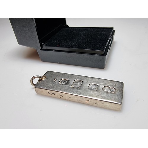 235 - A good quality hallmarked silver heavy thick gauge ingot with large clear hallmarks to the front. Th... 