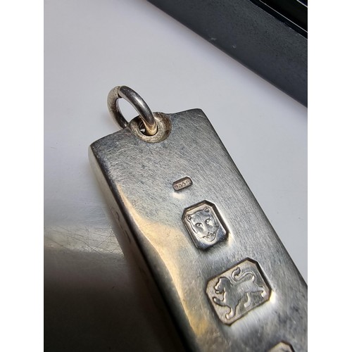 235 - A good quality hallmarked silver heavy thick gauge ingot with large clear hallmarks to the front. Th... 