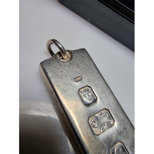 235 - A good quality hallmarked silver heavy thick gauge ingot with large clear hallmarks to the front. Th... 