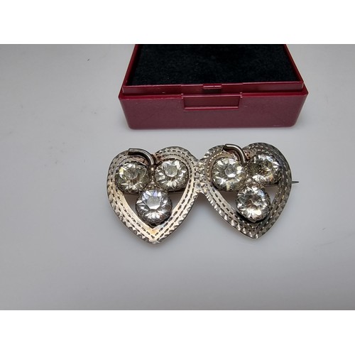 236 - A pretty vintage hallmarked silver sweetheart brooch in the form of 2 hearts and 2 clovers with whit... 