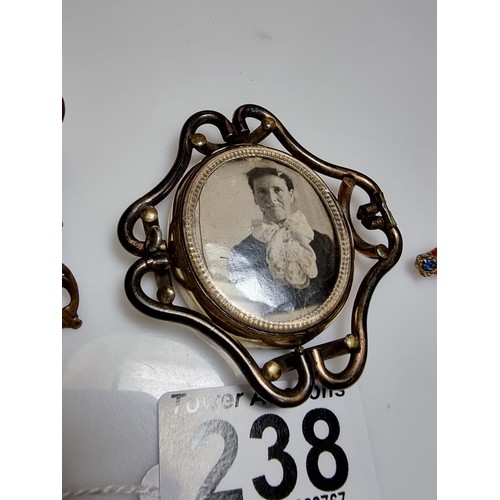 238 - A collection of vintage items to include an arts and crafts copper double photo frame and an arts an... 