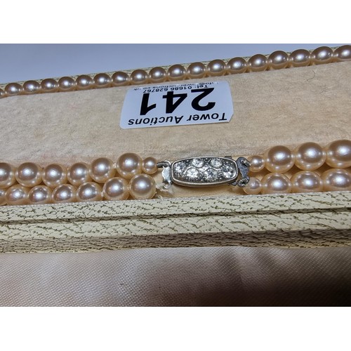 241 - A cased set of double strand Pompadour pearls necklace, in good clean condition.