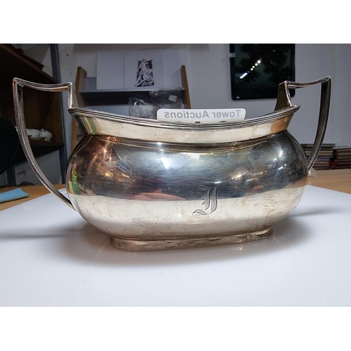 242 - A large hallmarked solid silver 2 handled bowl, hallmarked for Chester 1924 by the Barker brothers. ... 