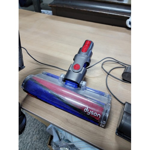 Dyson V7 vacuum cleaner with multiple attachments with brand new