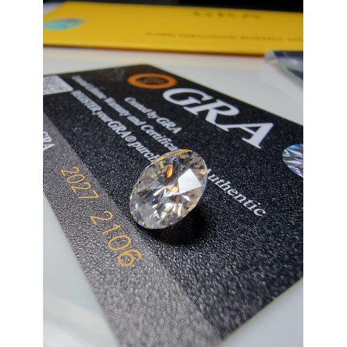 250 - A 5ct moissanite diamond with a diameter of 11mm with full report, the moissanite has a colour grade... 