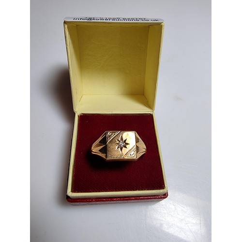 246 - A hallmarked 9ct yellow gold gents ring inset with a diamond to the centre, in excellent clean condi... 