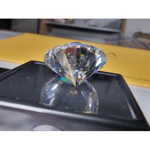 254 - A stunning very rare and large 30ct moissanite diamond with a diameter of 20mm with full report, the... 