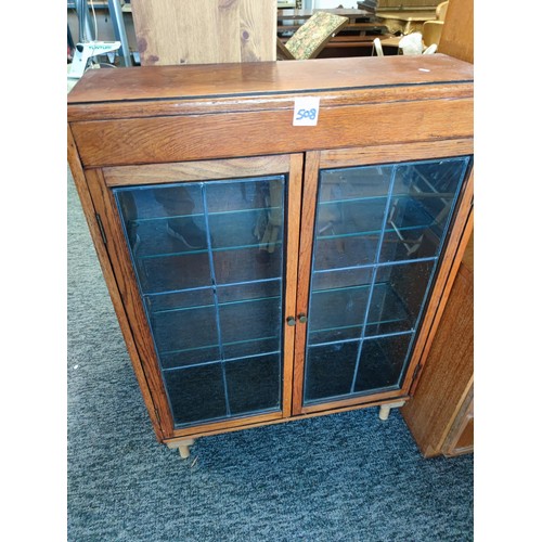 508 - Small oak bookshelf with 2 glazed doors 2 glazed shelves