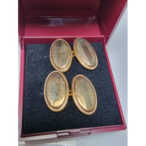 257 - Hallmarked 9ct yellow gold pair of cufflinks featuring  ornate tops in excellent condition with no d... 