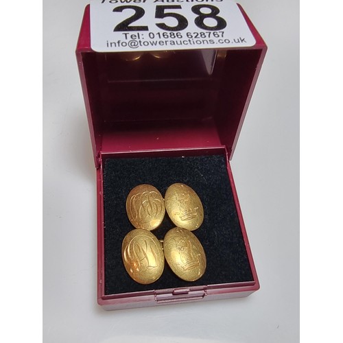 258 - A pair of fine quality hallmarked 18ct yellow gold pair of cufflinks with a family crest design of a... 