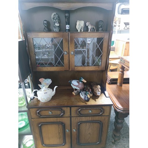 536 - Welsh dresser 2 cupboards 2 draws to base, 2 gazed cupboard to the top section one draw handle missi... 