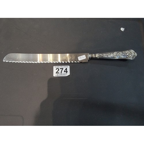 274 - Harrison Brothers hall marked Sheffield Silver handled 1963 cake knife in good order hallmarked to t... 