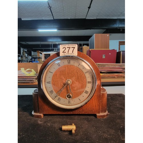 277 - Good quality wooden mantel clock with 8 day movement by Davall with one hole to the front platform e... 