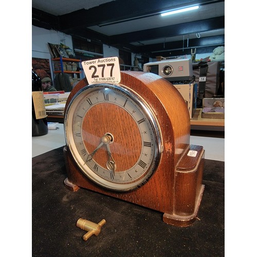 277 - Good quality wooden mantel clock with 8 day movement by Davall with one hole to the front platform e... 