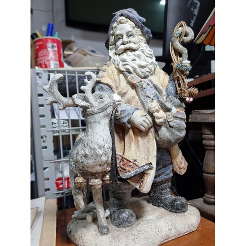 286 - Good quality chalk Santa in blue and white with reindeer, one antler is A/F height 43cm width 21cm