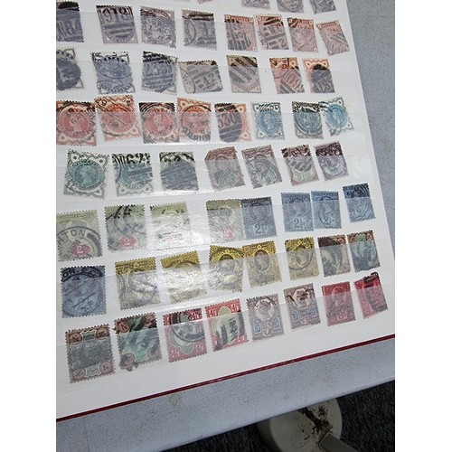 293 - Book containing a definitive collection of british stamps from the reign of Queen Victoria to Queen ... 