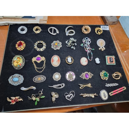 287 - large collection of 37x various costume brooches to include scarf pins, cameos, hard stone brooches ... 