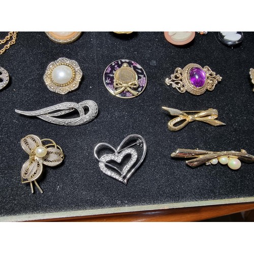 287 - large collection of 37x various costume brooches to include scarf pins, cameos, hard stone brooches ... 