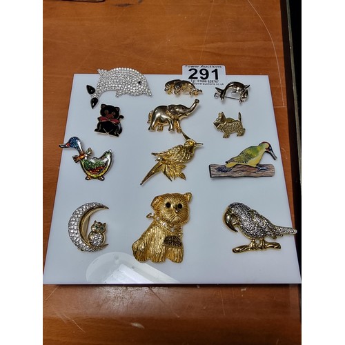 291 - Collection of 12x animal related brooches to include a large dog brooch 4x bird brooches, 3x dolphin... 