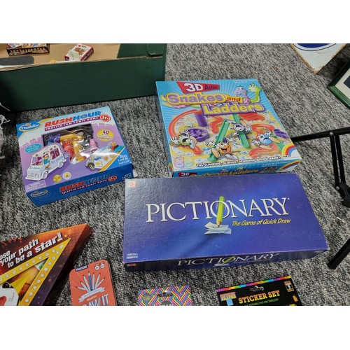 77A - A  box full of board games and toys to include a tin full of Pokémon cards (2022 editions) and unuse... 