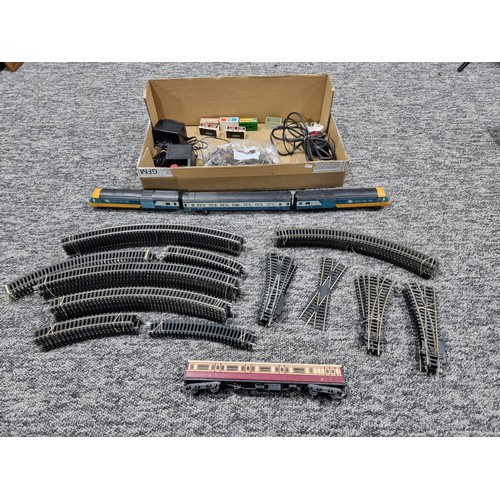 72 - A box of good OO gauge Hornby train items to include an intercity 125, power loco, dummy loco and co... 