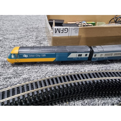 72 - A box of good OO gauge Hornby train items to include an intercity 125, power loco, dummy loco and co... 