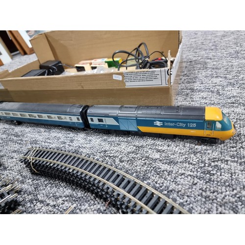 72 - A box of good OO gauge Hornby train items to include an intercity 125, power loco, dummy loco and co... 