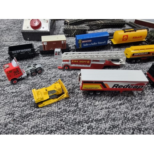 72A - A box full of good OO gauge train items, to include a Tri-ang and R150 loco and tender, a quantity o... 