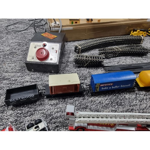 72A - A box full of good OO gauge train items, to include a Tri-ang and R150 loco and tender, a quantity o... 