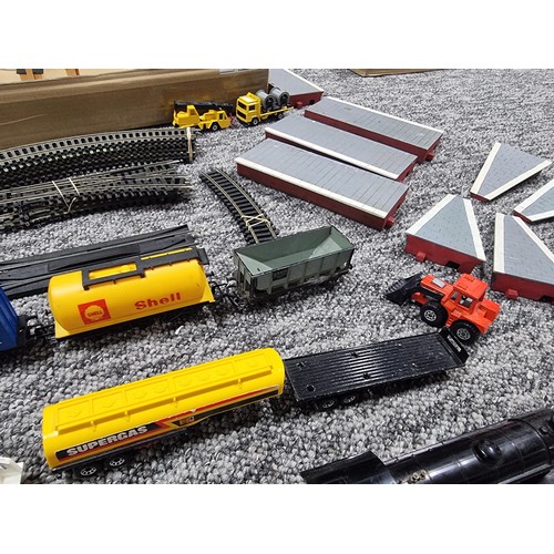 72A - A box full of good OO gauge train items, to include a Tri-ang and R150 loco and tender, a quantity o... 