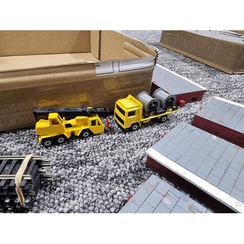 72A - A box full of good OO gauge train items, to include a Tri-ang and R150 loco and tender, a quantity o... 