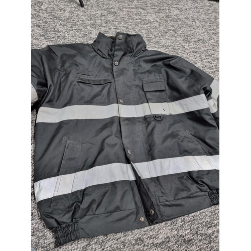 72B - A good heavy duty waterproof jacket by Port West, size large, along with an as new panoply yellow wa... 