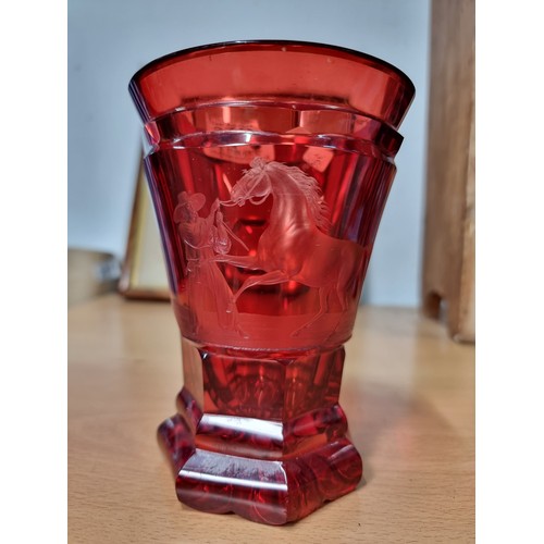 270 - Antique Red glass bohemian vase with a etching of a Mexican or Spanish Cowboy breaking in a horse in... 