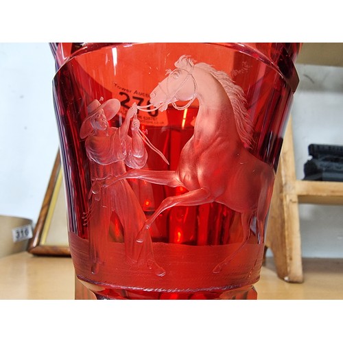 270 - Antique Red glass bohemian vase with a etching of a Mexican or Spanish Cowboy breaking in a horse in... 