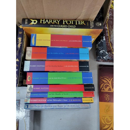 96 - A box of Harry Potter items including 2023 calendar,  8x dvd's inc Harry Potter and the Prisoner of ... 