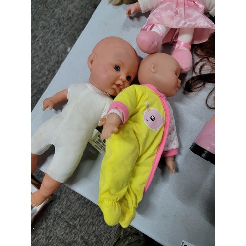 102 - Large quantity of dolls inc a cititoy doll, a doll with a light up heart beat etc