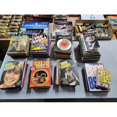 103 - Very large quantity of Pop related books inc David Cassidy, Solid Gold, Guinness British hit singles... 