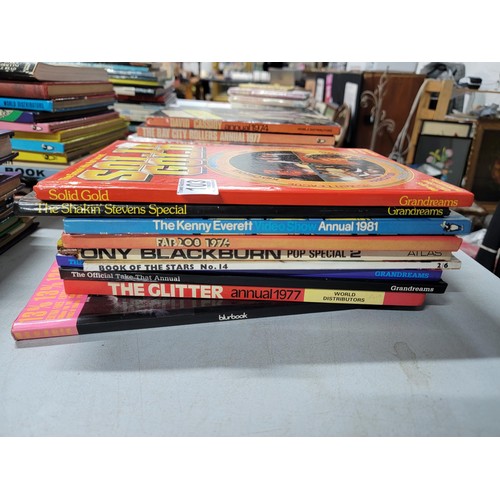 103 - Very large quantity of Pop related books inc David Cassidy, Solid Gold, Guinness British hit singles... 