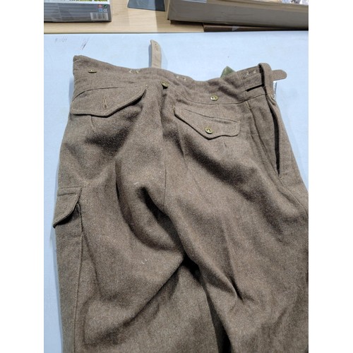 110 - Pair of vintage British 1955 battle dress trousers with the crows foot mark to the label in very goo... 