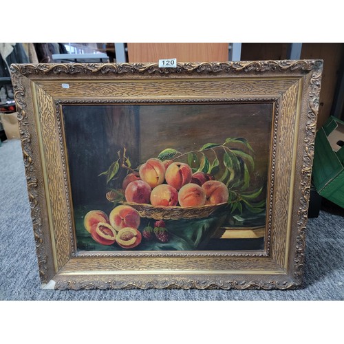 120 - Framed oil on board of a still life scene of peaches in a bowl, in an ornate gilt frame, signed to l... 